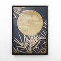 Framed artwork with a gold moon and leaf design on a dark background