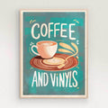Framed artwork with a coffee cup and vinyl record design on a teal background with natural/oak frame