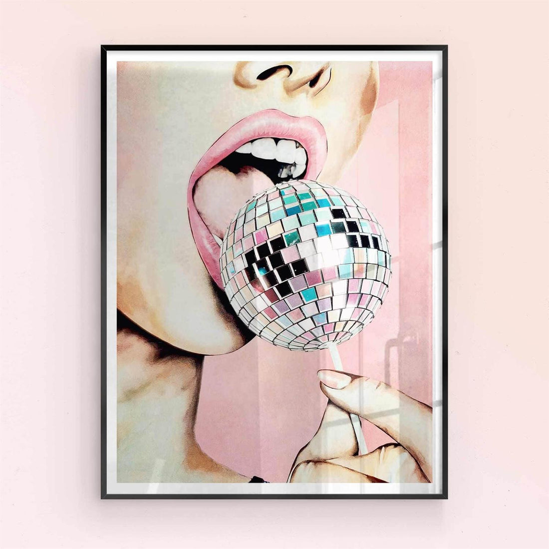 Framed artwork of a person's mouth with a disco ball against a pink black frame background 