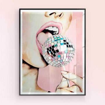 Framed artwork of a person's mouth with a disco ball against a pink black frame background 
