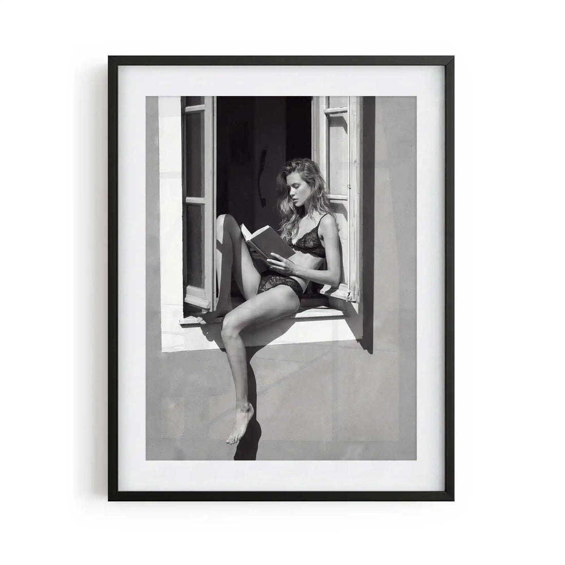 black framed poster print featuring window seat artwork with monochrome tones and luxury bedroom aesthetic by AfterHours Gallery