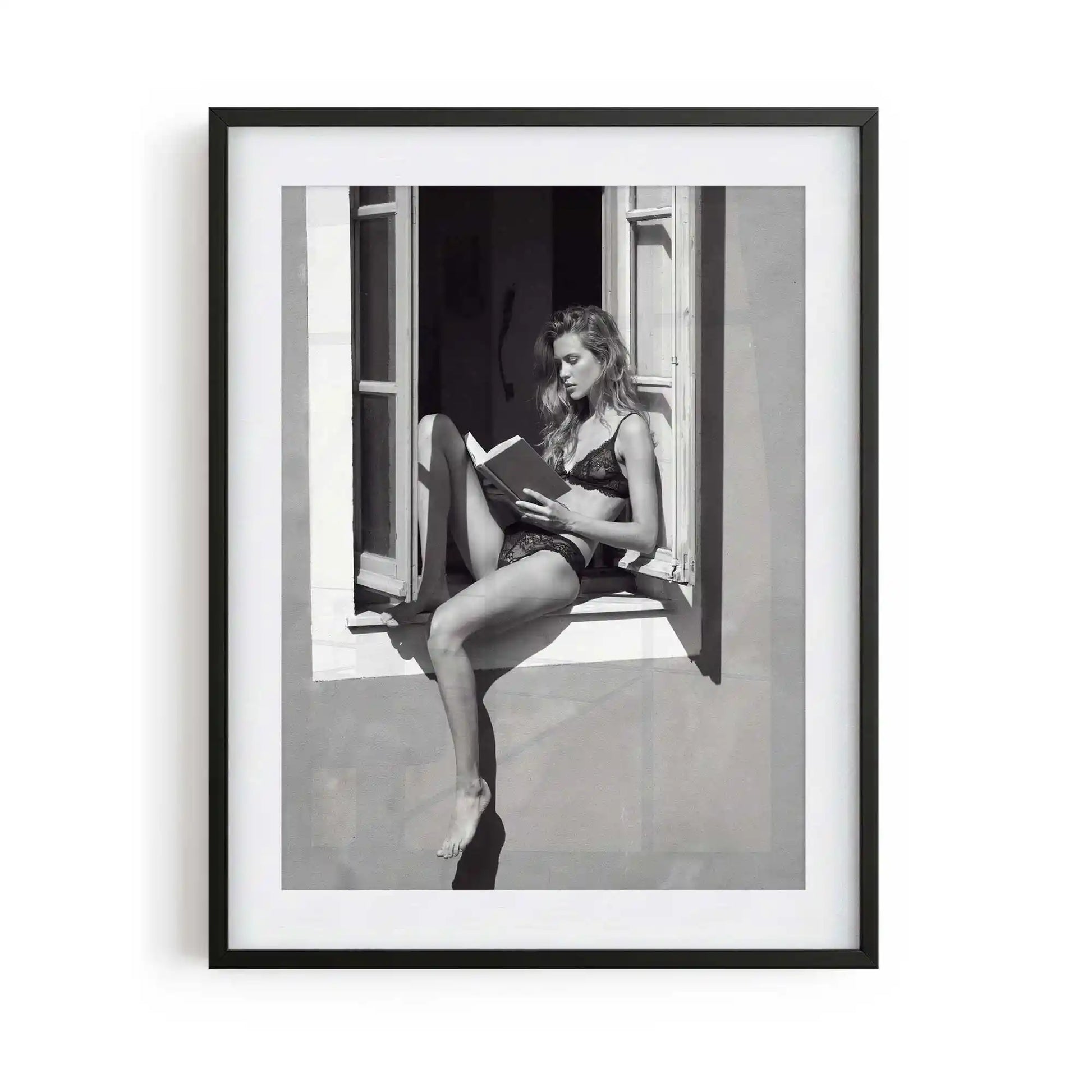 black framed poster print featuring window seat artwork with monochrome tones and luxury bedroom aesthetic by AfterHours Gallery