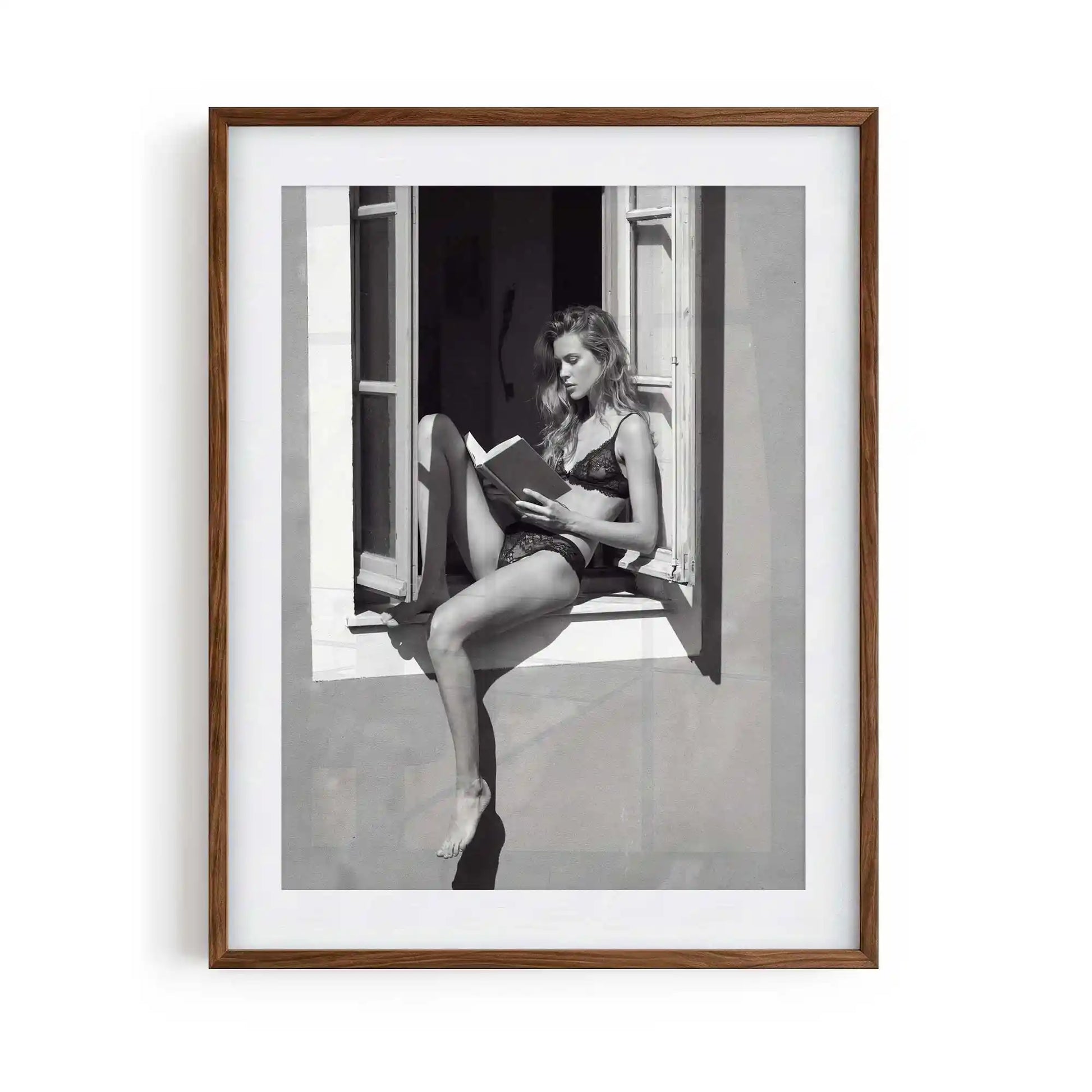 black framed poster print featuring window seat artwork with monochrome tones and luxury bedroom aesthetic by AfterHours Gallery