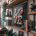 Decorative shelf with a colorful 'LOVE' artwork b Afterhours Gallery