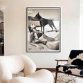 Framed black and white artwork of a woman and dog on a beach, hanging on a wall above a modern interior.