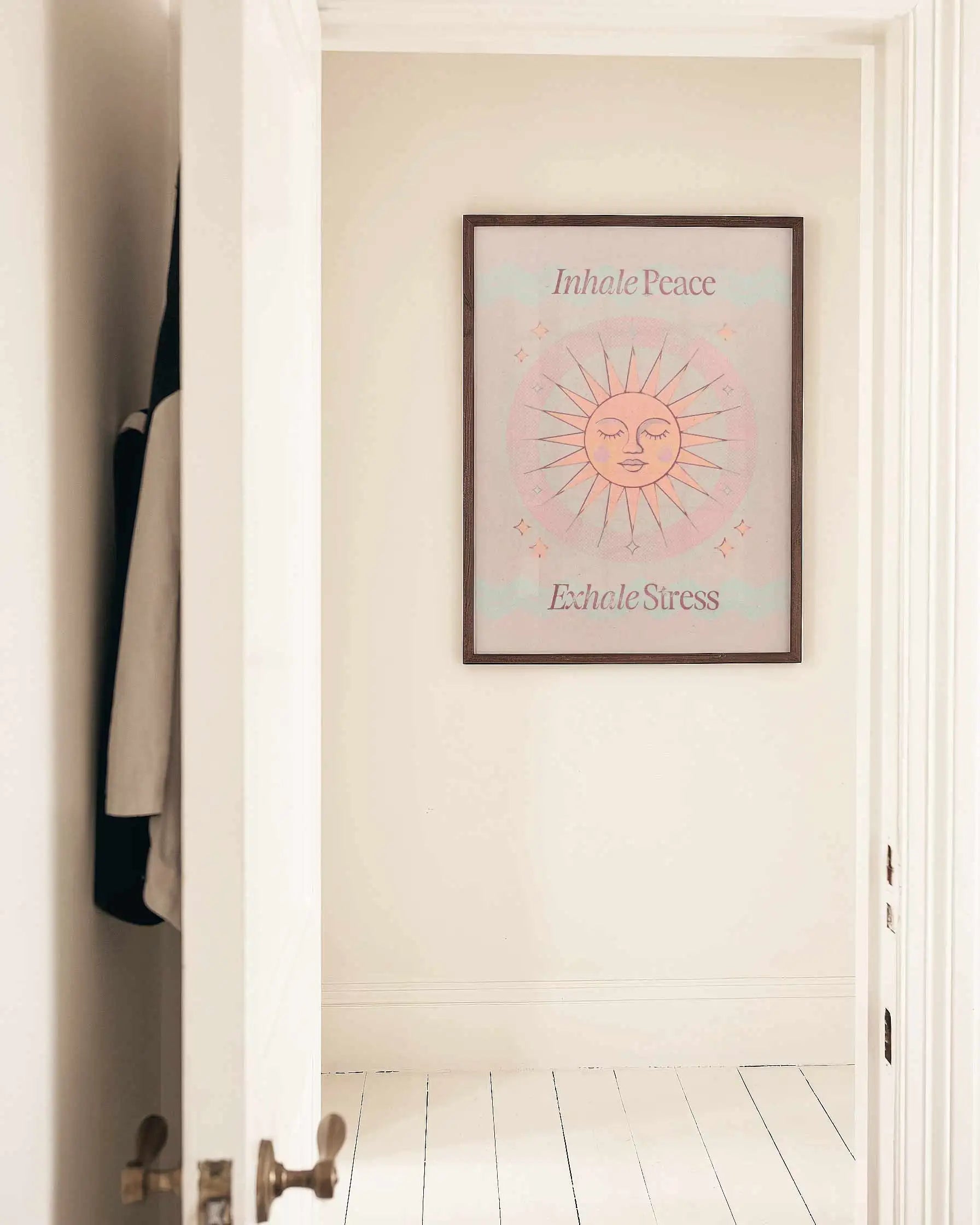 Calming Inhale Peace, Exhale Stress quote wall art styled in a modern neutral interior with minimalist and Japandi-inspired décor.