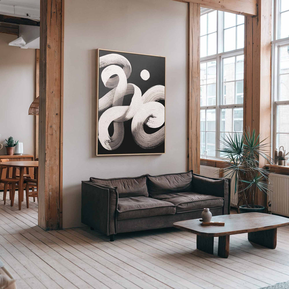 Still in Motion abstract canvas in oak frame on neutral wall