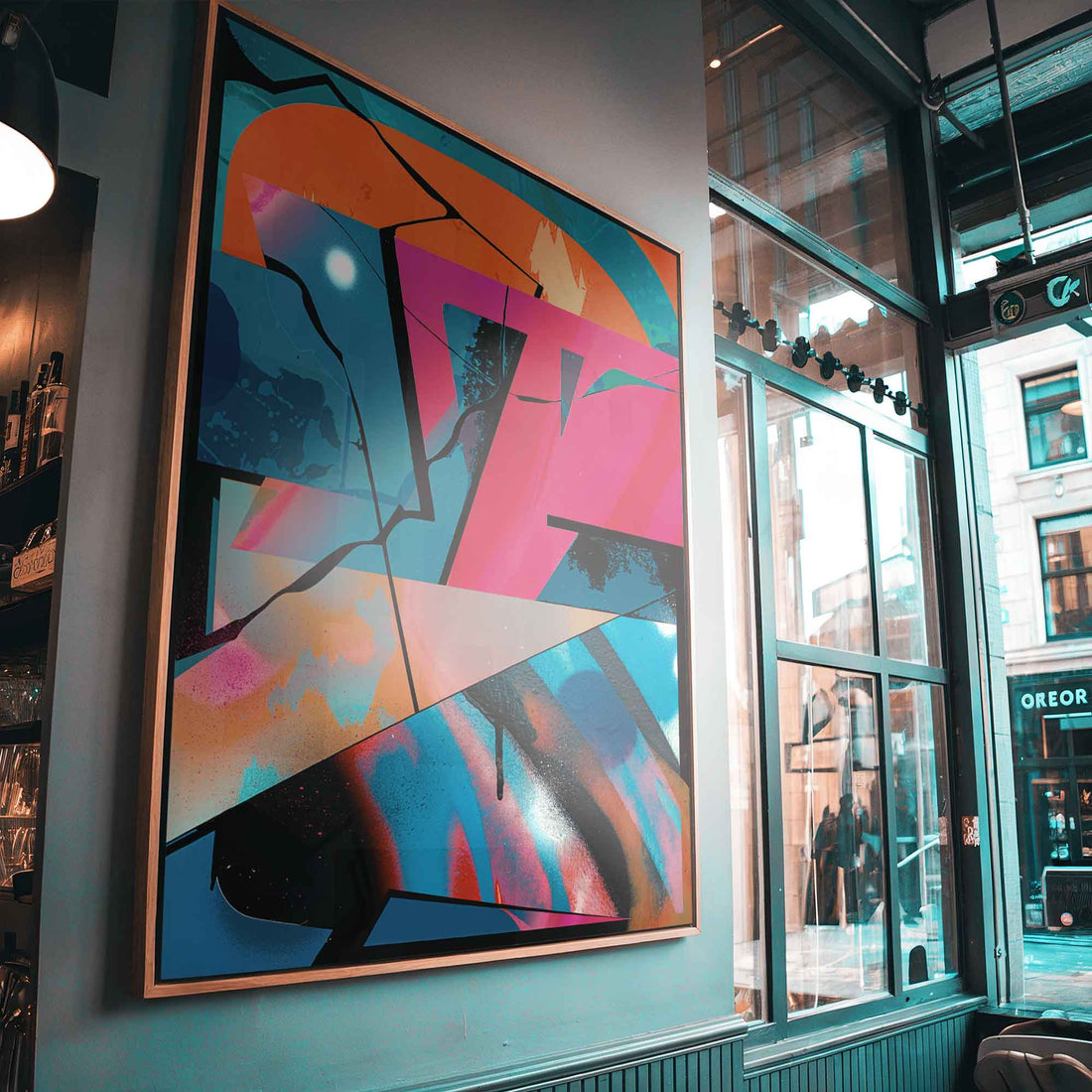 Oak framed canvas with colorful graffiti design