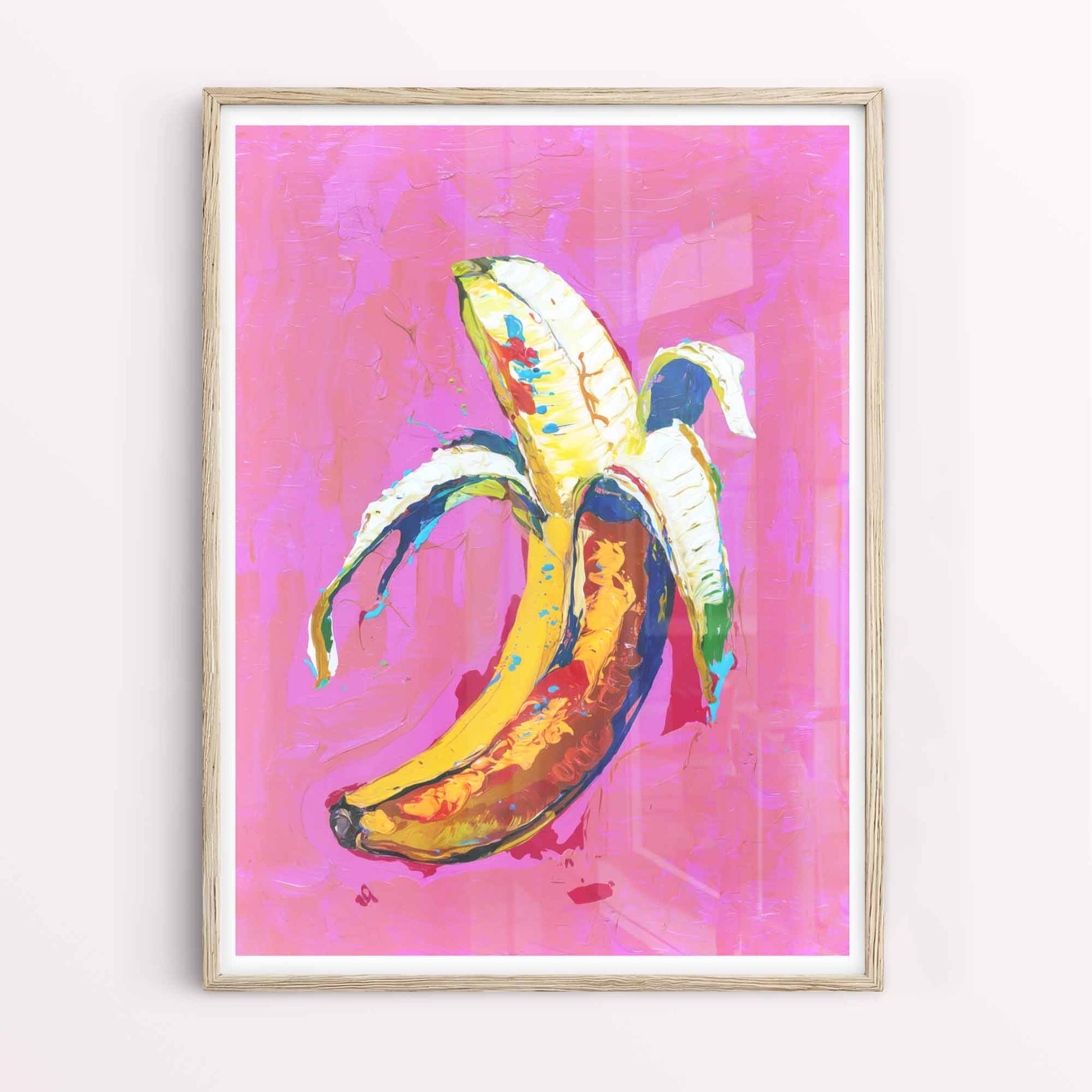 Bright banana wall art in oak frame