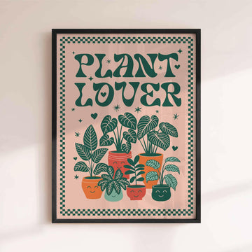 Framed poster with 'Plant Lover' text and illustrations of potted plants on a beige background. afterhours gallery