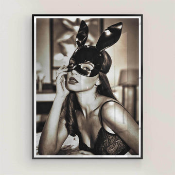 Framed black and white art print of a woman wearing a mask with bunny ears.