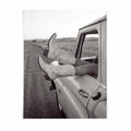 Road Trip is a western photography poster featuring cowgirl boots and a vintage truck. Rustic Americana wall art for country, ranch and modern western interiors.