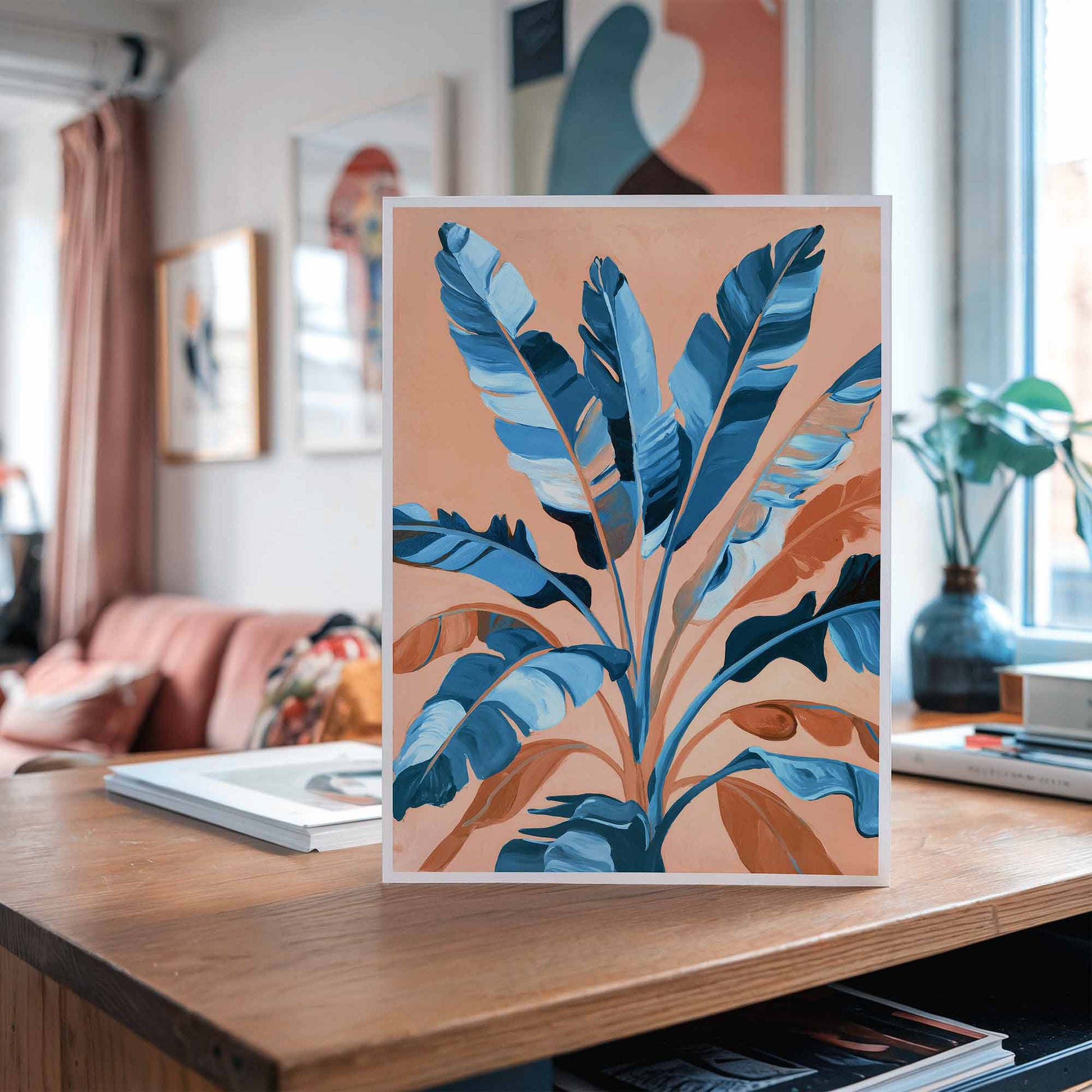Tropical leaves artwork in pastel orange and blue