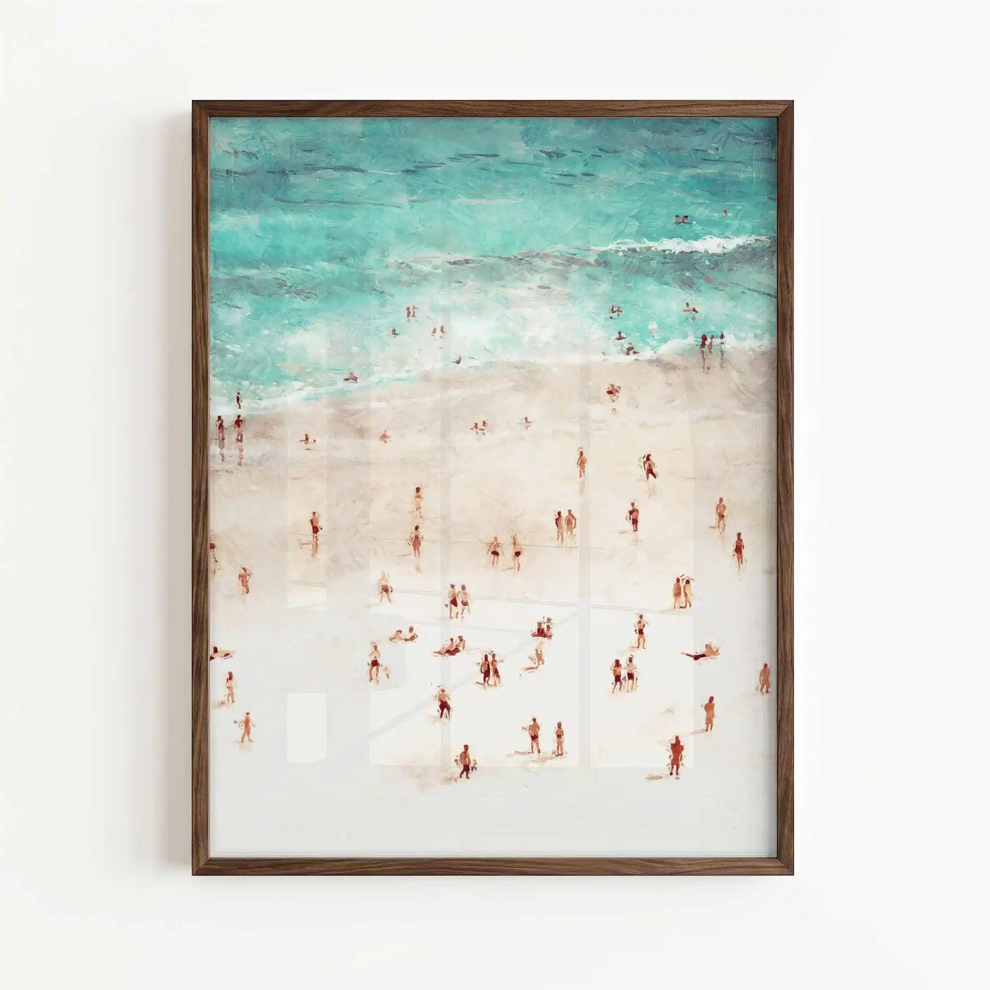 Coastal wall art print featuring an overhead beach scene with tiny people framed in brown frame by Afterhours Gallery