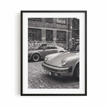 Nine Eleven Porsche 911 black and white photography print displayed in a contemporary black frame.