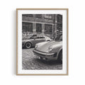 Nine Eleven classic Porsche wall art displayed in a natural oak frame for modern interiors.
