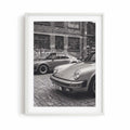 Nine Eleven monochrome Porsche wall art displayed in a white gallery frame.
