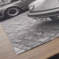 Close-up detail of Nine Eleven Porsche 911 monochrome automotive photography print showing iconic headlights and bodywork.